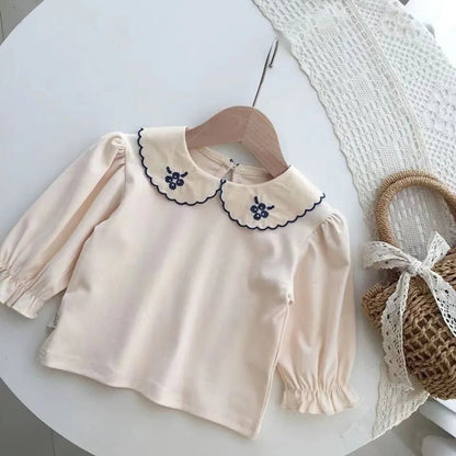 Robe en bretelles brodées